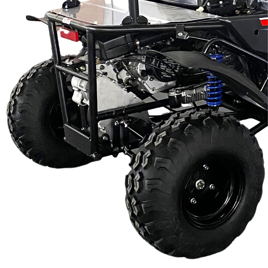 Close-up of the rear wheel and suspension system of the GL MOTO Youth UTV, showcasing the rugged tire design and shock absorber.